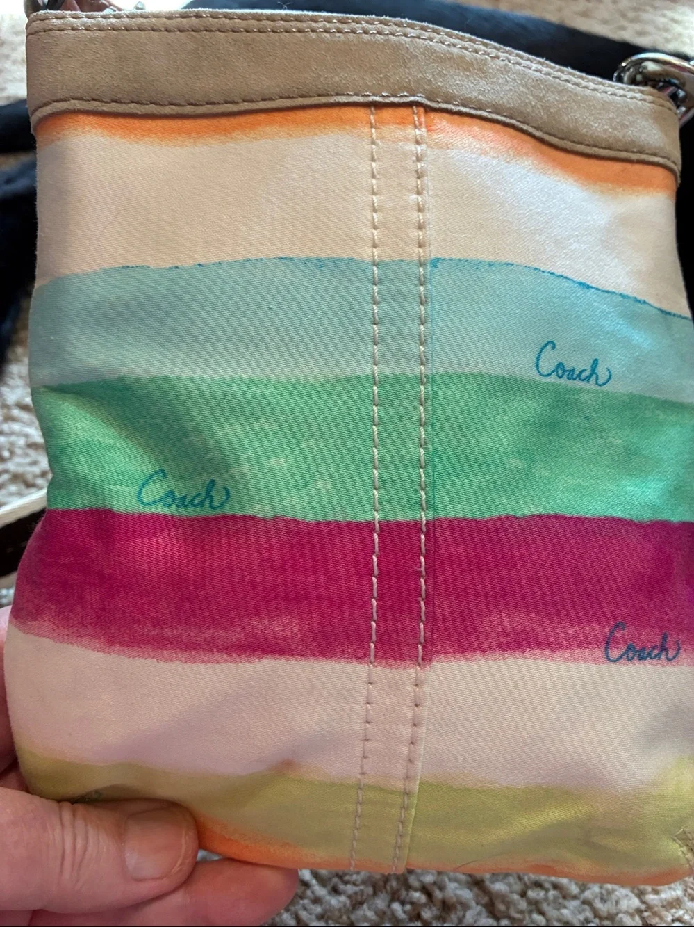 Coach Multicolor Canvas Crossbody bag with Turquoise Lining.